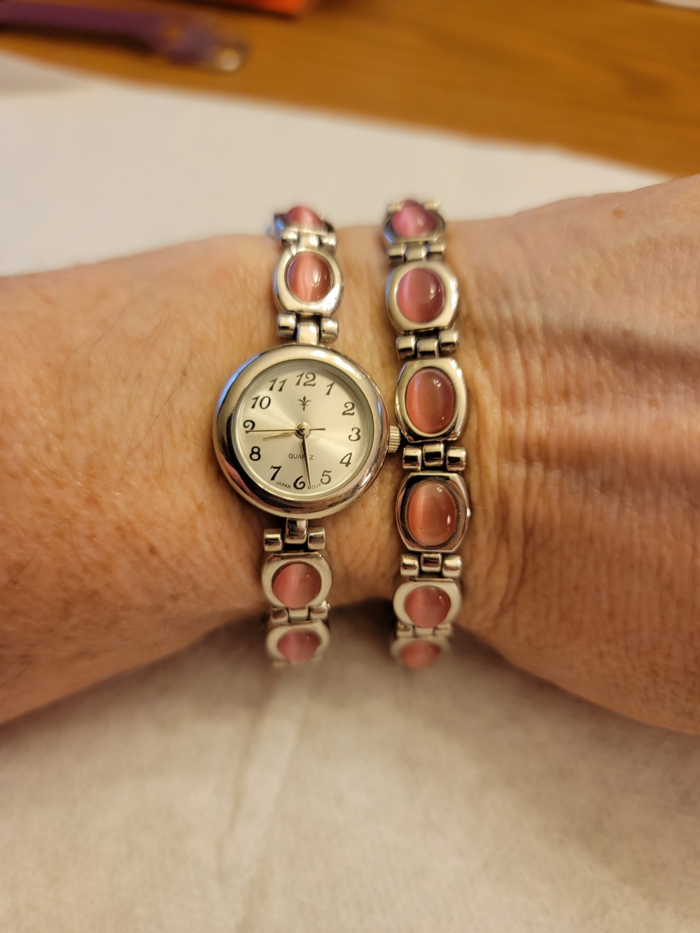 Women's Silver Bracelet Watch with Pink Stone Accents